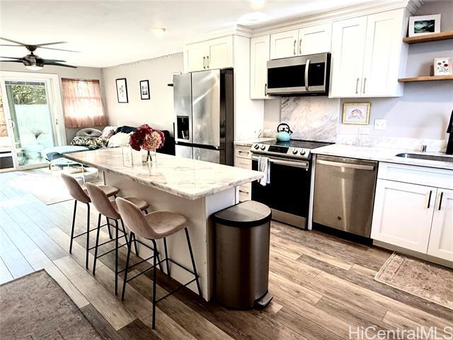 68-090-90 Au St in Waialua, HI - Building Photo