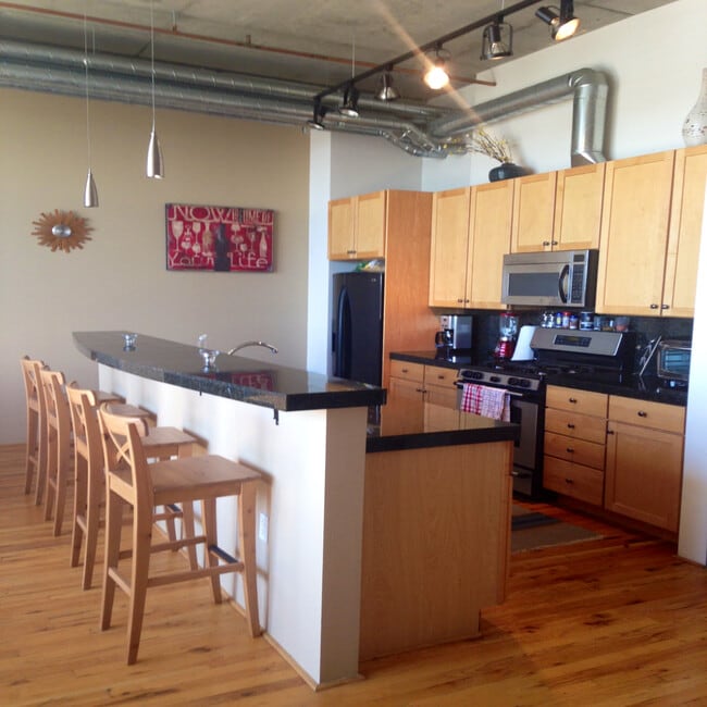 2899 N Speer Blvd, Unit 404 in Denver, CO - Foto de edificio - Building Photo