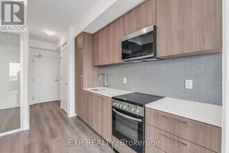 7437 Kingston Rd in Toronto, ON - Building Photo - Building Photo