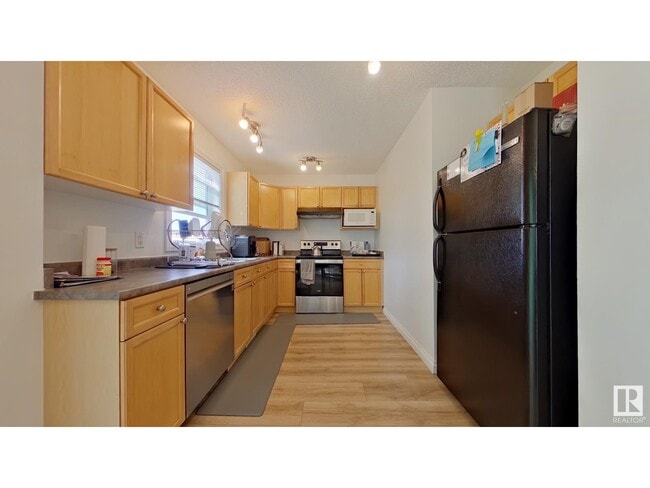 property at 12050 17 Ave SW