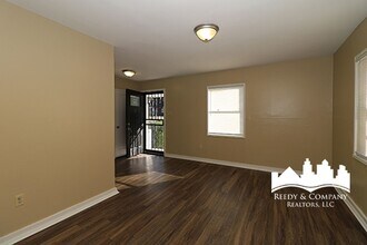 Gorgeous Two-Story White House with Bonus Room in Memphis, TN - Building Photo - Building Photo