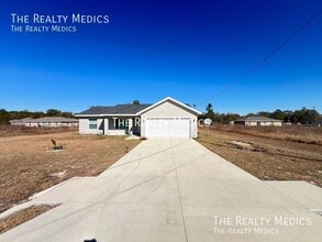 297 Malauka Loop in Ocklawaha, FL - Building Photo - Building Photo