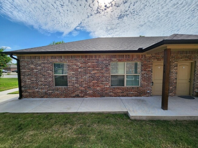 property at 418 E 13th St