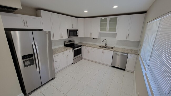 6289 Lear Dr in Atlantis, FL - Building Photo - Building Photo