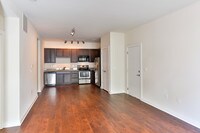 Modern Style Olive living space - The Vyne on Central Apartments in Charlotte, North Carolina