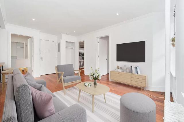 property at 203 E 4th St