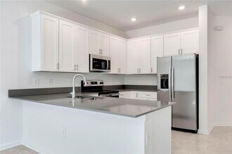 7485 Stone Crk Trl in Kissimmee, FL - Building Photo - Building Photo