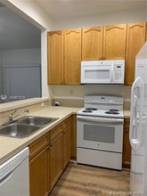 3451 Merrick Ln-Unit -1404 in Margate, FL - Building Photo - Building Photo