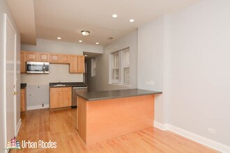 1001 W Sunnyside Ave, Unit A00C in Chicago, IL - Building Photo - Building Photo