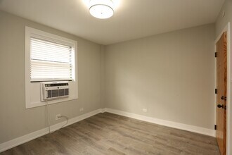 521 W Belmont Ave, Unit 4H in Chicago, IL - Building Photo - Building Photo