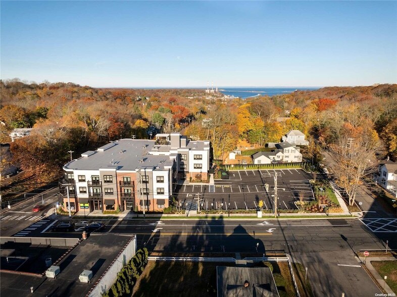 1 N Country Rd, Unit 106 in Port Jefferson, NY - Foto de edificio