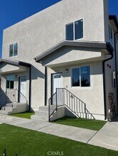 409 E 99th St in Los Angeles, CA - Foto de edificio - Building Photo