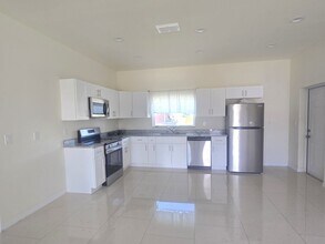 322 Mangonia Ave in Lehigh Acres, FL - Building Photo - Building Photo