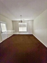 7688 Creekside Ln in Riverdale, GA - Foto de edificio - Building Photo