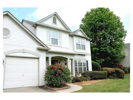 7320 Brassfield Dr in Cumming, GA - Building Photo