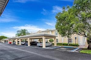 1305 Sweetwater Cove-Unit -9-104 in Naples, FL - Building Photo - Building Photo