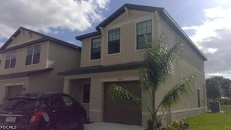 14059 Oviedo Pl in Tice, FL - Building Photo