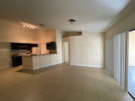 9999 Summerbreeze Dr in Sunrise, FL - Building Photo
