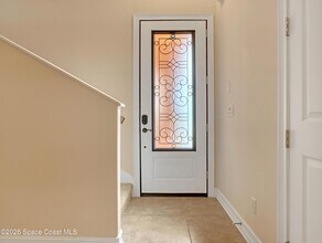 118 Mediterranean Way in Indian Harbour Beach, FL - Foto de edificio - Building Photo