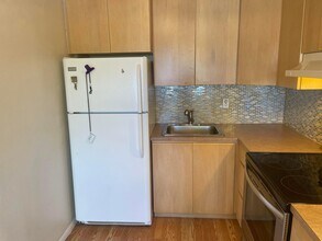 100 Village Green Cir E in Palm Springs, FL - Building Photo - Building Photo