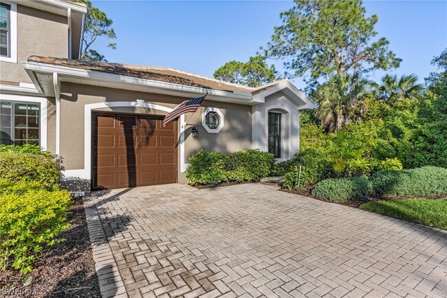 7780 Woodbrook Cir in Naples, FL - Building Photo - Building Photo