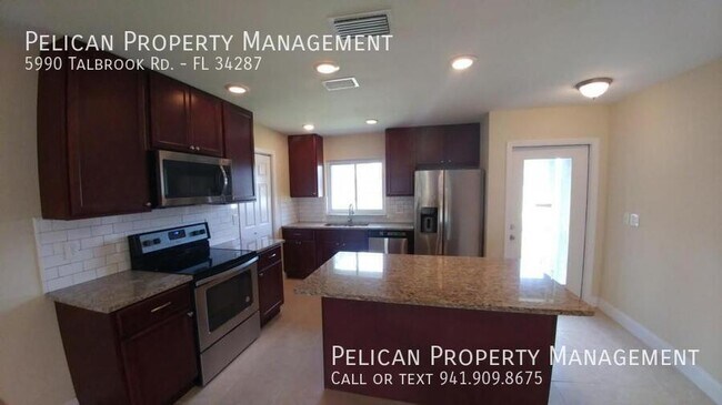 5990 Talbrook Rd in North Port, FL - Building Photo - Building Photo
