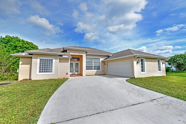 3717 SW Swope St in Port St. Lucie, FL - Building Photo - Building Photo