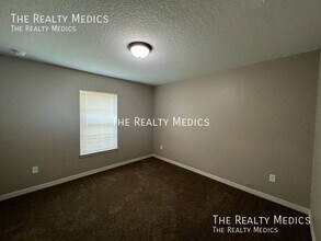 325 Malauka Loop in Ocklawaha, FL - Building Photo - Building Photo