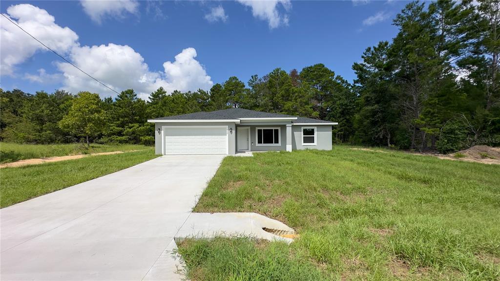 122 Malauka Loop in Ocklawaha, FL - Building Photo