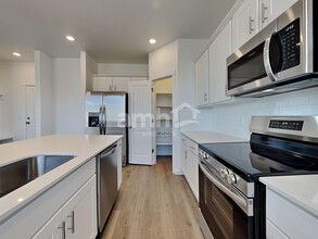 26122 E Calhoun Pl in Aurora, CO - Building Photo - Building Photo