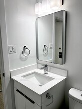 Qute Place in Edmonton, AB - Building Photo - Building Photo