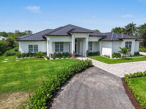 9105 Whippoorwill Trail in Jupiter, FL - Building Photo - Building Photo