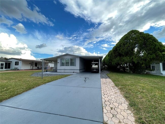 1214 Dustin Dr in Lady Lake, FL - Building Photo - Building Photo
