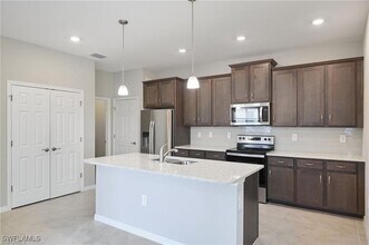 1149 S Town and River Dr in Ft. Myers, FL - Building Photo - Building Photo