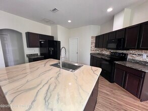 1458 Deming Dr SE in Palm Bay, FL - Building Photo - Building Photo