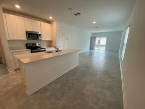 2146 Aquifer Ln in Davenport, FL - Building Photo - Building Photo