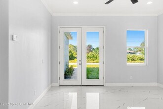 1410 Towton St SE in Palm Bay, FL - Building Photo - Building Photo