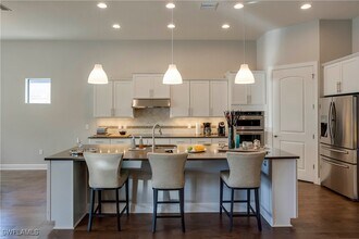 14020 Hawks Eye Ct in Estero, FL - Building Photo - Building Photo