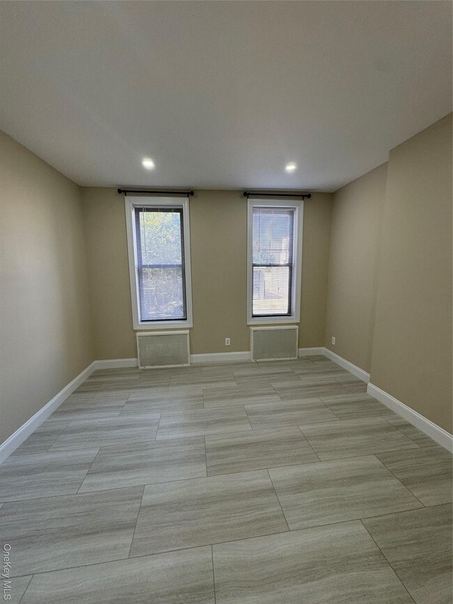 property at 59-42 Grove St
