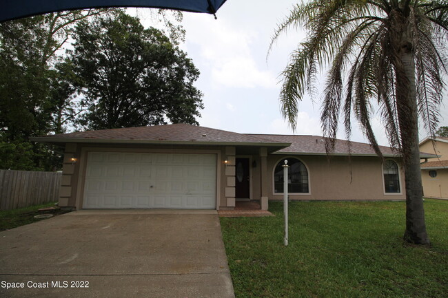 1735 Hazelton St NW in Palm Bay, FL - Building Photo - Building Photo