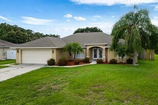 3718 SW Masilunas St in Port St. Lucie, FL - Building Photo