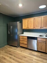 120 N Washington St, Unit #UPPR in Owosso, MI - Building Photo - Building Photo