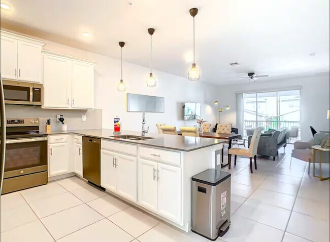 8879 Cabot Cliffs Dr in Kissimmee, FL - Building Photo - Building Photo