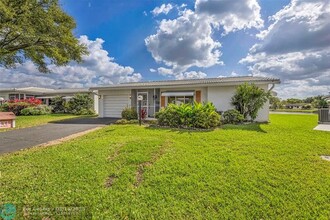 1010 NW 89th Way in Plantation, FL - Foto de edificio - Building Photo