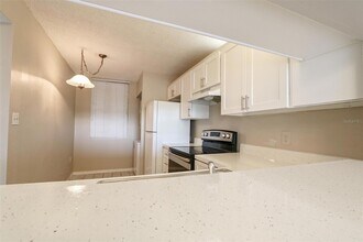 2424 W Tampa Bay Blvd, Unit L404 in Tampa, FL - Building Photo - Building Photo