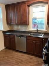 0 1st St-Unit -1 in Glen Cove, NY - Building Photo - Building Photo