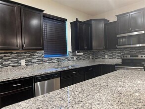8584 Rindge Rd in Polk City, FL - Building Photo - Building Photo
