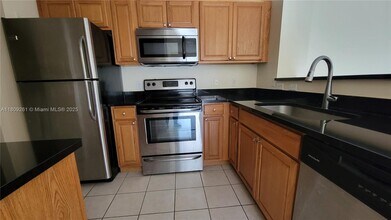 8000 N Nob Hill Rd in Tamarac, FL - Building Photo - Building Photo
