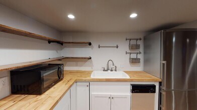 Bright South Park Hill basement apartment by William H McNichols Park in Denver, CO - Building Photo - Building Photo