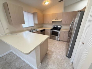 1034 W Jasmine Ln in North Lauderdale, FL - Building Photo - Building Photo